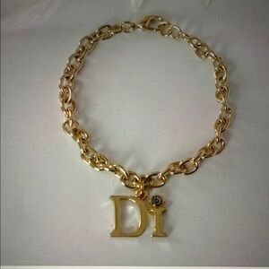 Chic Gold Bracelet with Di Initial Charm with a real diamond. 2 are available.